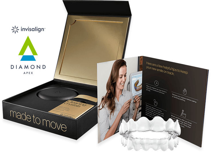 Open black Invisalign Diamond Apex kit with cleaning crystals, cleaning case, care instructions, and clear aligner tray.
