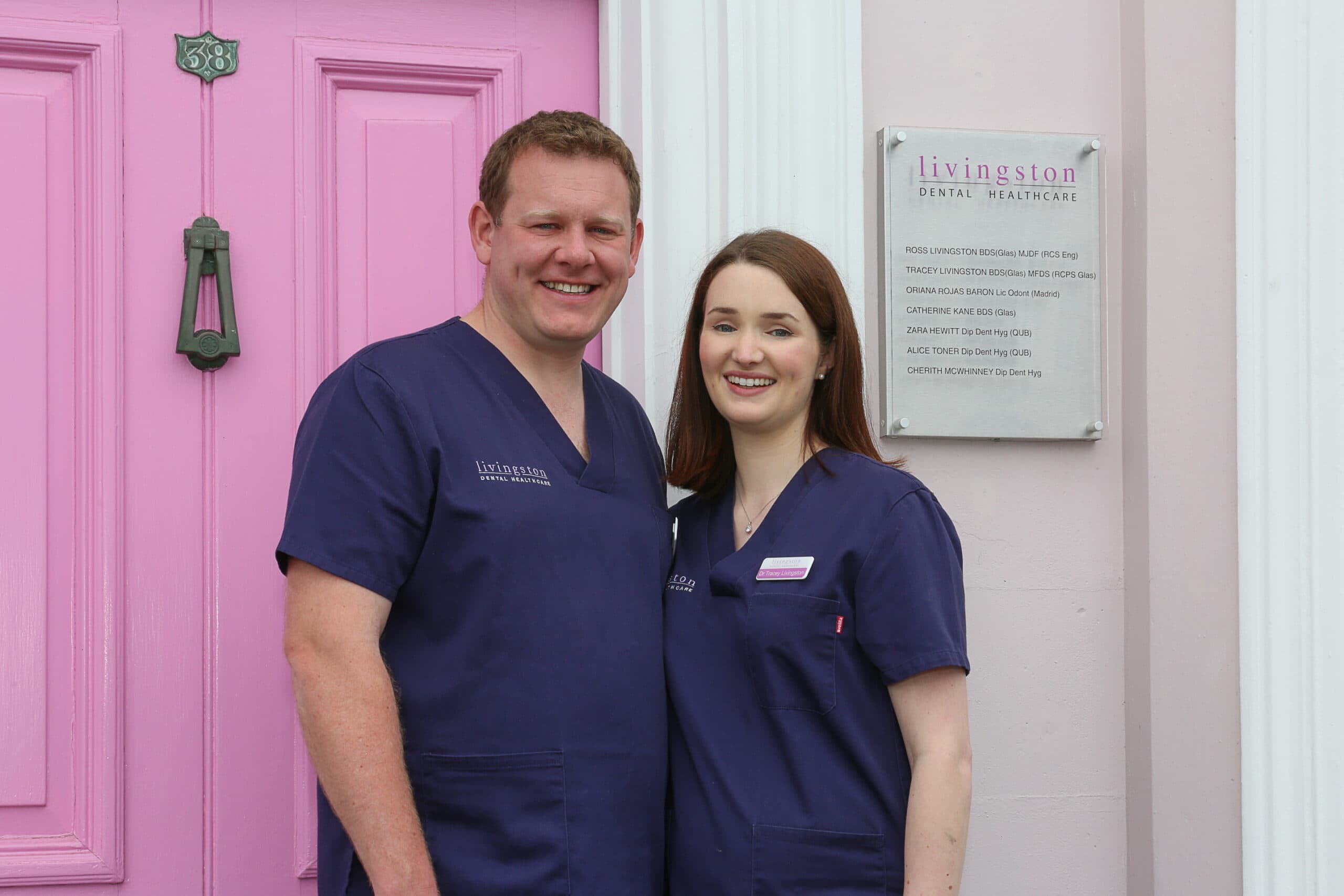 Ross Tracey by plaque pink door scaled