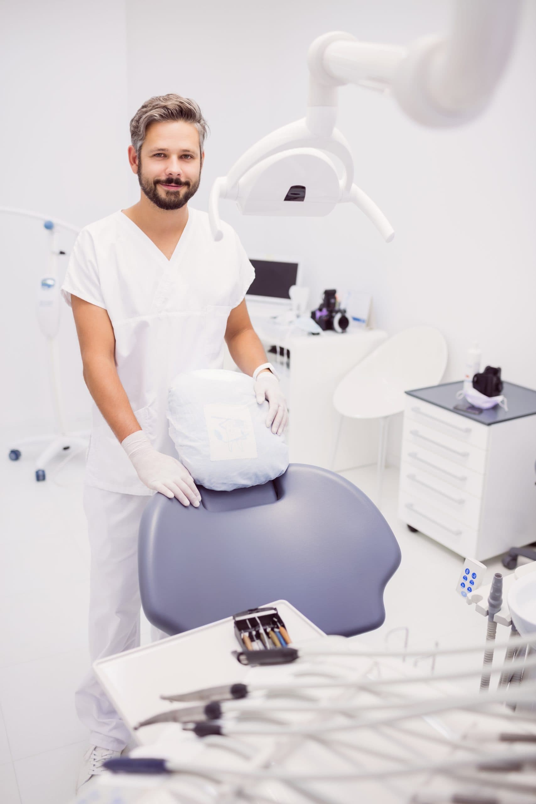 dentist standing clinic scaled
