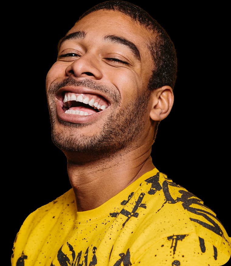 happy mixed race man smiling over yellow backgroun 2023 11 27 05 09 56 utc copy 1