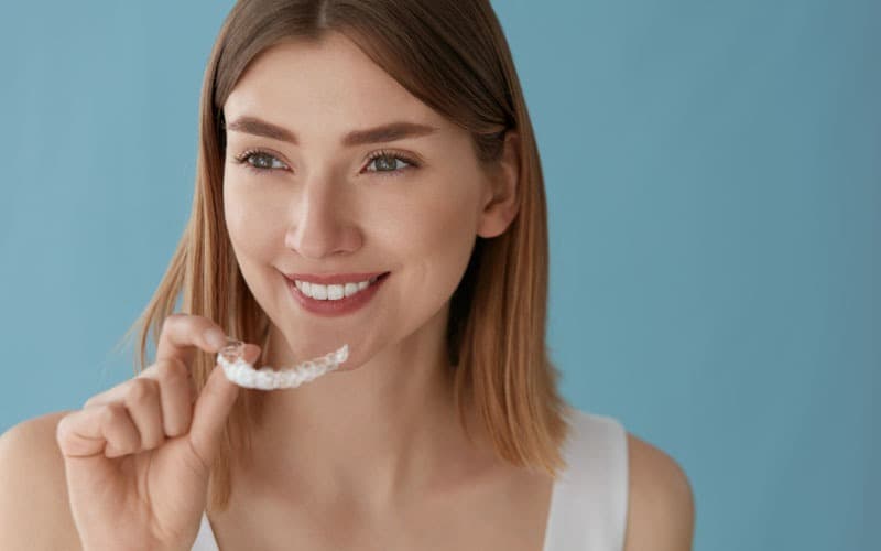 Woman with clear retainers