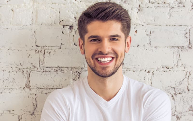 Smiling man with straight teeth