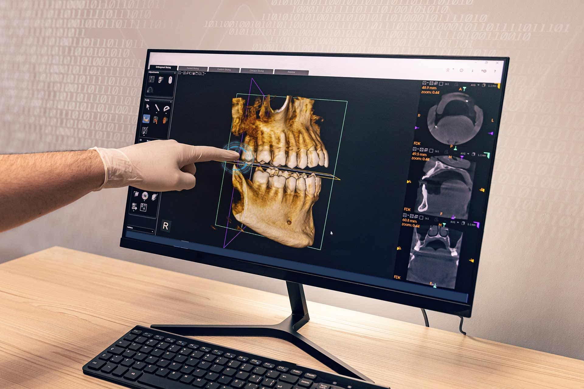 DoctorLookingAtHumanTeethX rayOnComputerMonitor web