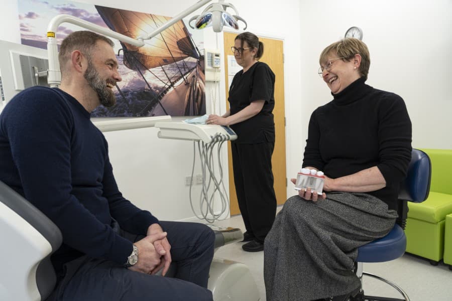 Mrs Judith Stocker Oral and Maxillofacial Surgeon and Implants Surgeon with patient