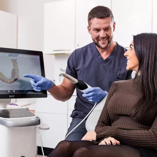 World class technology demonstrated to dental patient at Andrea Ubhi Dentistry.