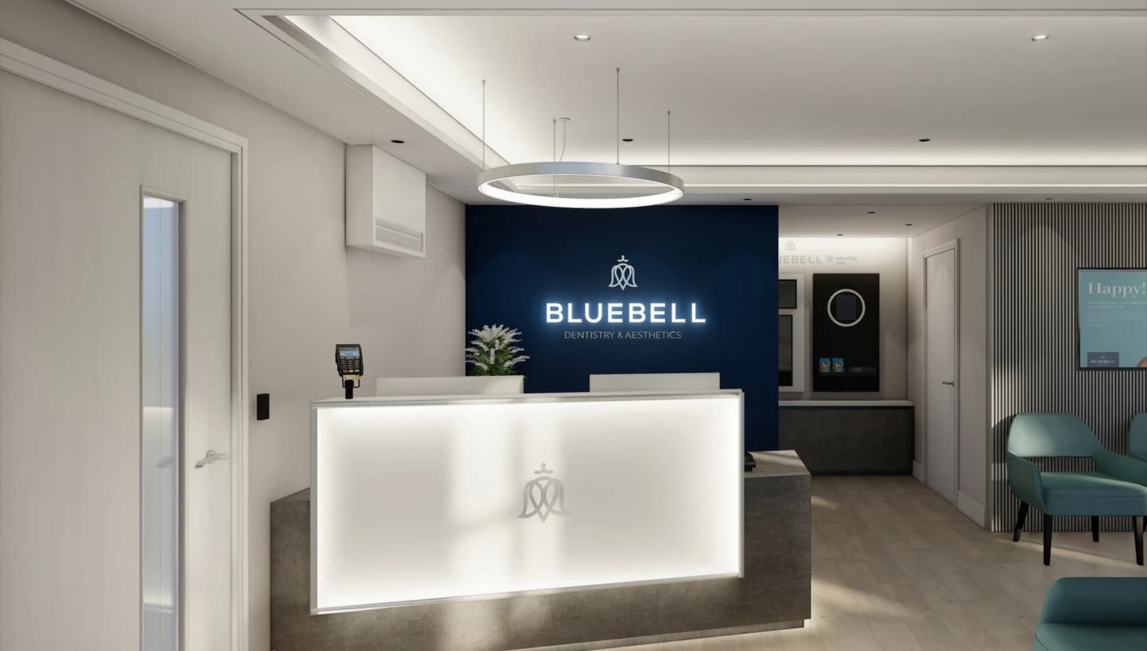 Modern reception area at Bluebell Dentistry & Aesthetics featuring a blue branded wall with illuminated logo, stone front desk with soft lighting, circular ceiling light, and a window display with flowers and product shelves.